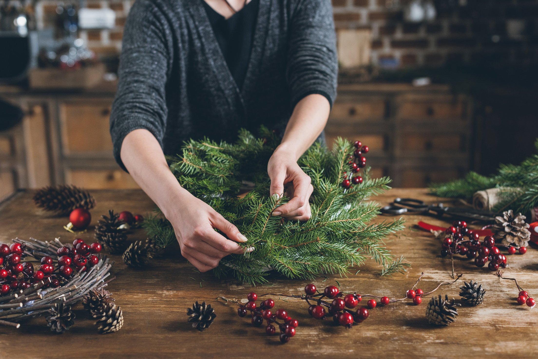 decorator making Christmas wreath